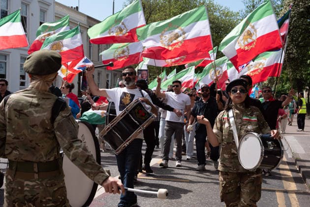 May 24, 2026, Glasgow, Scotland, UK: Members of Scotlands Iranian community opposed to the Islamic regime were joined by compatriots from further afield at a demonstration supporting anti-regime protesters imprisoned in Iran following uprisings earlier this year. Protesters voiced concerns over alleged human rights abuses and executions carried out by the regime. Glasgow UK  - ZUMAs357 20260524_zip_s357_013 Copyright: xCameronxScottx