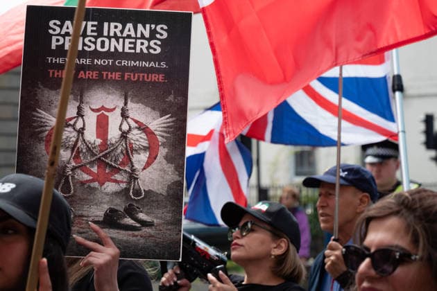 May 24, 2026, Glasgow, Scotland, UK: Members of Scotlands Iranian community opposed to the Islamic regime were joined by compatriots from further afield at a demonstration supporting anti-regime protesters imprisoned in Iran following uprisings earlier this year. Protesters voiced concerns over alleged human rights abuses and executions carried out by the regime. Glasgow UK  - ZUMAs357 20260524_zip_s357_014 Copyright: xCameronxScottx