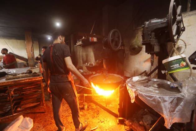 Palestinian workers produce traditional sweets ahead of Eid al-Adha Palestinian workers continued producing the traditional sweet known locally as Halakum at a factory in the Al-Daraj neighborhood, east of Gaza City, on May 24, 2026, ahead of Eid al-Adha. The factory resumed operations with limited resources after sustaining damage from Israeli airstrikes during the war. Halakum is a traditional sweet widely consumed during holidays, and the factory strives to provide it to residents despite the difficult living conditions and sharp decline in purchasing power in the Gaza Strip before Eid al-Adha. Photo by Bilal Osama apaimages Gaza city Gaza Strip Palestinian Territory 240526_Gaza_BO_01(46) Copyright: xapaimagesxBilalxOsamax xapaimagesx