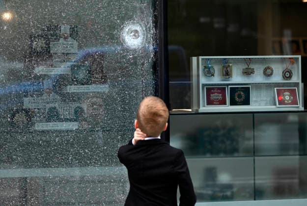 Bullet holes and shattered glass remain at The People s House near White House Complex Bullet holes and shattered glass remain at The People s House, on May 24, 2026, in Washington, DC after the U.S. Secret Service shot a person near the White House on Saturday. On Saturday, May 23, two people were struck in a shooting near the intersection of Pennsylvania Avenue and 17th Street Northwest, located just outside the White House complex. Photo by Olivier Douliery ABACAPRESS.COM Washington DC United States  Copyright: xDoulieryxOlivier ABACAx