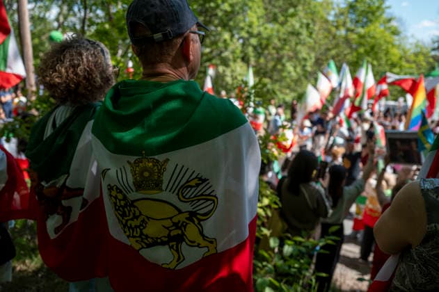 May 24, 2026, Stockholm, Sweden: Anti-Iranian regime protesters gather outside the Iranian Embassy in Stockholm, Sweden, on May 24, 2026, calling on Sweden to close the embassy and demanding restored internet access in Iran. Some demonstrators carried flags and signs in support of Reza Pahlavi. During the protest, participants staged a symbolic performance depicting imprisoned women confronting captured clerics, while chanting slogans against the Iranian regime and the ruling mullahs. Sweden  - ZUMAa136 20260524_zap_a136_022 Copyright: xJoelxLindhex