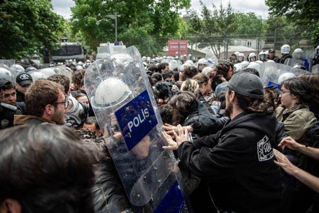 May 24, 2026, Istanbul, Istanbul, Turkey: Students, labor unions and civil society groups clashed with riot police on the third day after Istanbul Bilgi University was allegedly shut down by presidential decree signed by Turkish President Recep Tayyip Erdogan in Istanbul, Turkey, on May 22, 2026. Students occupying university buildings in protest against the closure decision were forcibly removed from the campus by police. Riot police used pepper spray during the intervention as violent scuffles erupted around the university. Demonstrators continued to protest in defense of academic freedom and university autonomy amid a heavy police presence. Istanbul Turkey - ZUMAt171 20260524_zip_t171_026 Copyright: xAbdullahxTepelix