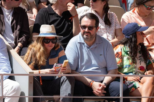 2026 French Open - Celebrities In Stand Day 1 NB Elodie and Jean-Francois Piege in stand during the 2026 French Open at Roland Garros on May 24, 2026 in Paris, France. Photo by Nasser Berzane ABACAPRESS.COM  Copyright: xBerzanexNasser ABACAx
