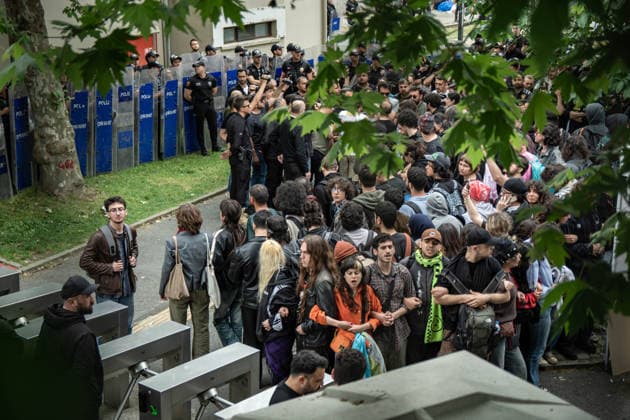 May 24, 2026, Istanbul, Istanbul, Turkey: Students, labor unions and civil society groups clashed with riot police on the third day after Istanbul Bilgi University was allegedly shut down by presidential decree signed by Turkish President Recep Tayyip Erdogan in Istanbul, Turkey, on May 22, 2026. Students occupying university buildings in protest against the closure decision were forcibly removed from the campus by police. Riot police used pepper spray during the intervention as violent scuffles erupted around the university. Demonstrators continued to protest in defense of academic freedom and university autonomy amid a heavy police presence. Istanbul Turkey - ZUMAt171 20260524_zip_t171_041 Copyright: xAbdullahxTepelix