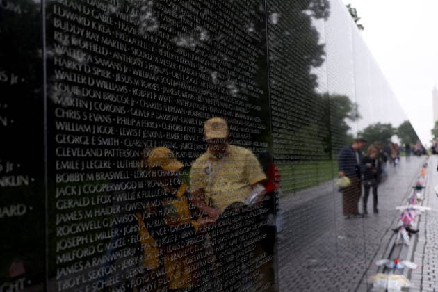 May 24, 2026, Washington, District Of Columbia, USA: Visitors are reflected at the Vietnam Veterans Memorial following the Rolling to Remember ride over Memorial Day weekend in Washington, DC, USA, on May 24, 2026. The Rolling to Remember tradition has been active for 38 years, honouring fallen service members, prisoners of war, and those still missing in action during Memorial Day weekend. Washington USA  - ZUMAs337 20260524_znp_s337_049 Copyright: xGentxShkullakux