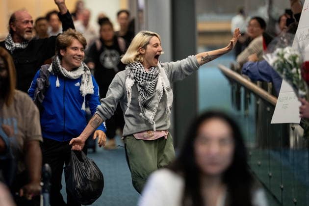 May 24, 2026, Vancouver, Bc, CANADA: Mary Grace Mathisen, member of the Gaza flotilla runs to friends and family as she arrives at the Vancouver International Airport in Richmond B.C., on Sunday, May 24, 2026. Vancouver CANADA  - ZUMAc35_ 20260524_zaf_c35_145 Copyright: xEthanxCairnsx