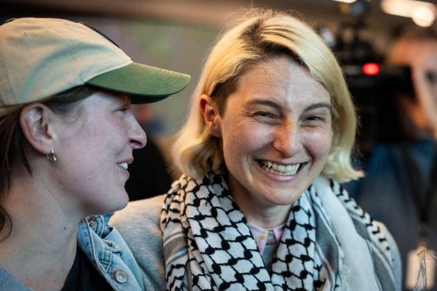 May 24, 2026, Vancouver, Bc, CANADA: Mary Grace Mathisen, member of the Gaza flotilla reunites with friends as she arrives at the Vancouver International Airport in Richmond B.C., on Sunday, May 24, 2026. Vancouver CANADA  - ZUMAc35_ 20260524_zaf_c35_149 Copyright: xEthanxCairnsx