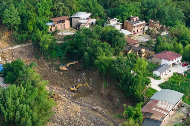 CHONGQING, CHINA - MAY 24: Rescue workers carry out search and rescue operations after extreme rainfalls trigger flash floods and geological disasters on May 24, 2026 in Yongchuan District, Chongqing City, China. Devastating rainstorms struck parts of Southwest China s Chongqing over the weekend, resulting in multiple casualties and missing people in the municipality s Yongchuan and Beibei districts. Rescue efforts are ongoing. As of 2:30 pm on May 24, local authorities reported three deaths and 17 people missing in Yongchuan, with another two people missing in Beibei.  Copyright: xChinaxNewsxServicex 111643846456