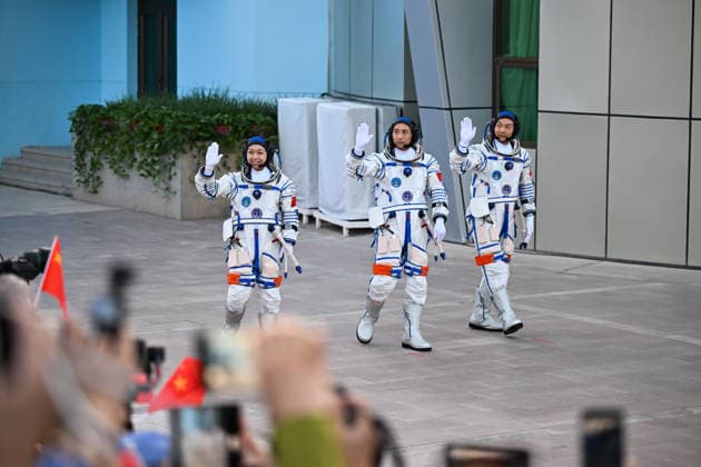 (260525) -- BEIJING, May 25, 2026 -- Chinese astronauts Zhu Yangzhu (C), Zhang Zhiyuan (R) and Li Jiaying attend the send-off ceremony at the Jiuquan Satellite Launch Center in northwest China, May 24, 2026. A send-off ceremony for the three Chinese astronauts of the Shenzhou-23 crewed space mission was held here on Sunday. ) XINHUA PHOTOS OF THE DAY LixZhipeng 