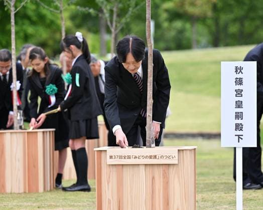 Japanese crown prince at greenery event Japanese Crown Prince Fumihito plants a tree at a park in Tokyo after attending a greenery conservation event on May 24, 2026. (Pool photo)  A14AA0005610756P