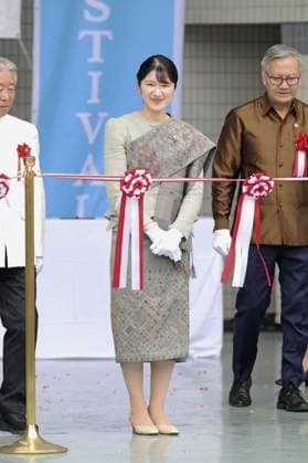 Princess Aiko at Lao festival Japan s Princess Aiko clad in traditional Lao costume attends the opening ceremony of a Lao festival at Tokyo s Yoyogi Park on May 23, 2026. (Pool photo)  A14AA0005611056P