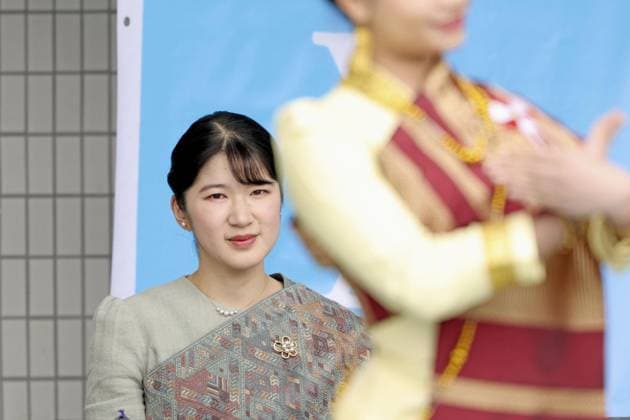 Princess Aiko at Lao festival Japan s Princess Aiko clad in traditional Lao costume watches a traditional dance at a Lao festival at Tokyo s Yoyogi Park on May 23, 2026. (Pool photo)  A14AA0005611067P