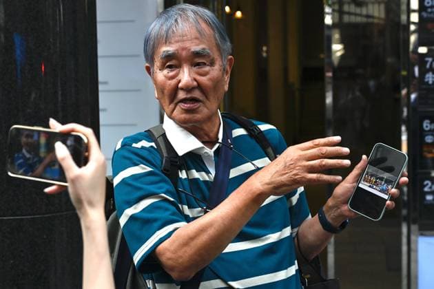 Police respond to suspected irritant spray incident in Tokyo TOKYO, JAPAN - MAY 25: Members of media interview a man on the street as Police officers and emergency responders gather outside the GINZA SIX commercial complex in Tokyo’s Ginza district on May 25, 2026, Tokyo, Japan, after multiple people reported feeling unwell during an incident involving a suspected irritant substance. Authorities are investigating the circumstances of the case. David Mareuil Anadolu Tokyo Japan. Editorial use only. Please get in touch for any other usage.  Copyright: x2026xAnadoluxDavidxMareuilx