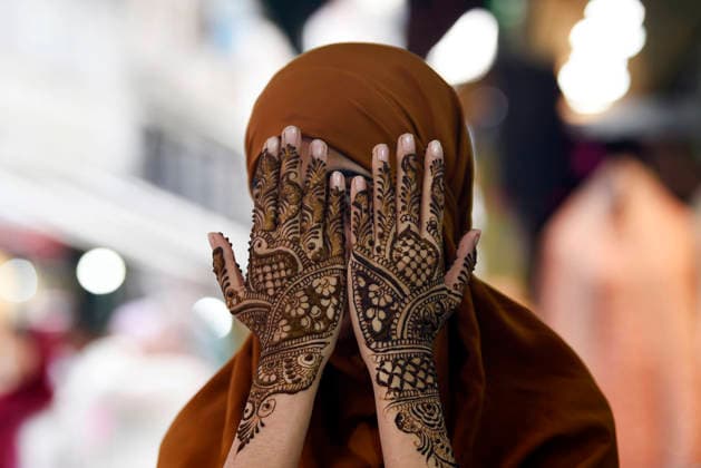 A woman shows her hands adorned with henna ahead of the Eid al-Adha festival Srinagar, May 25 (ANI): A woman shows her hands adorned with henna ahead of the Eid al-Adha festival, in Srinagar on Monday. Srinagar Jammu and Kashmir India Copyright: xANIx ANI_20260525268