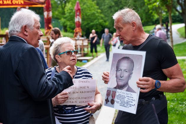 May 25, 2026, Brno, South Moravia, Czech Republic: Supporter of reconciliation with Sudeten Germans and Opponents of reconciliation with Sudeten Germans during a commemorative ceremony honoring the victims of Nazism in Brno, Czech Republic, on May 25, 2026. The 76th Congress of Sudeten Germans took place in Brno, Czech Republic, from May 22 to 25, 2026, marking the first time the event was held in the country. Brno Czech Republic  - ZUMAc315 20260525_zsp_c315_013 Copyright: xMichaelxCabalx