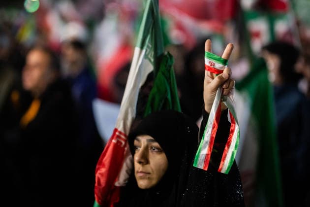 May 25, 2026, Iran, Iran: Pro-government supporters wave national flags during a state-organized rally, amid a ceasefire with Iran, the US, and Israel. President Donald Trump issued a fresh warning to Iran on May 17, saying it had to move quickly towards a peace deal or there won t be anything left of them. Washington, locked in conflict with Tehran since US and Israeli forces launched major strikes on the Islamic Republic beginning February 28, has struggled to break an impasse and make any progress toward ending a war that has shaken the Middle East and sent energy prices climbing. Iran s foreign ministry said on May 25, that Tehran was collecting fees for navigational services on ships transiting the strategic Strait of Hormuz, r - ZUMAi98_ 20260525_zih_i98_002 Copyright: xIranianxSupremexLeader SxOfficex