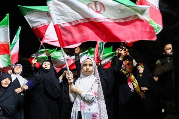 May 25, 2026, Iran, Iran: Pro-government supporters wave national flags during a state-organized rally, amid a ceasefire with Iran, the US, and Israel. President Donald Trump issued a fresh warning to Iran on May 17, saying it had to move quickly towards a peace deal or there won t be anything left of them. Washington, locked in conflict with Tehran since US and Israeli forces launched major strikes on the Islamic Republic beginning February 28, has struggled to break an impasse and make any progress toward ending a war that has shaken the Middle East and sent energy prices climbing. Iran s foreign ministry said on May 25, that Tehran was collecting fees for navigational services on ships transiting the strategic Strait of Hormuz, r - ZUMAi98_ 20260525_zih_i98_036 Copyright: xIranianxSupremexLeader SxOfficex