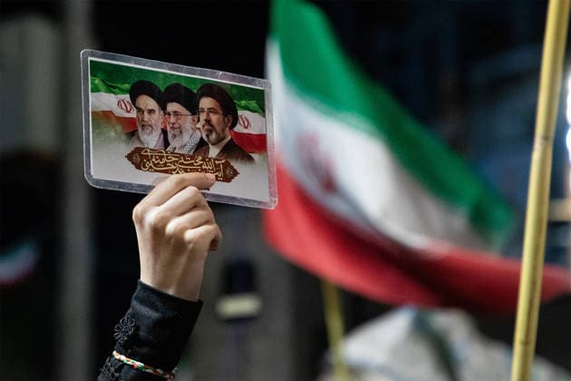 May 25, 2026, Iran, Iran: Pro-government supporters wave national flags during a state-organized rally, amid a ceasefire with Iran, the US, and Israel. President Donald Trump issued a fresh warning to Iran on May 17, saying it had to move quickly towards a peace deal or there won t be anything left of them. Washington, locked in conflict with Tehran since US and Israeli forces launched major strikes on the Islamic Republic beginning February 28, has struggled to break an impasse and make any progress toward ending a war that has shaken the Middle East and sent energy prices climbing. Iran s foreign ministry said on May 25, that Tehran was collecting fees for navigational services on ships transiting the strategic Strait of Hormuz, r - ZUMAi98_ 20260525_zih_i98_052 Copyright: xIranianxSupremexLeader SxOfficex