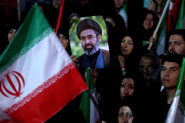 May 25, 2026, Iran, Iran: Pro-government supporters wave national flags during a state-organized rally, amid a ceasefire with Iran, the US, and Israel. President Donald Trump issued a fresh warning to Iran on May 17, saying it had to move quickly towards a peace deal or there won t be anything left of them. Washington, locked in conflict with Tehran since US and Israeli forces launched major strikes on the Islamic Republic beginning February 28, has struggled to break an impasse and make any progress toward ending a war that has shaken the Middle East and sent energy prices climbing. Iran s foreign ministry said on May 25, that Tehran was collecting fees for navigational services on ships transiting the strategic Strait of Hormuz, r - ZUMAi98_ 20260525_zih_i98_058 Copyright: xIranianxSupremexLeader SxOfficex