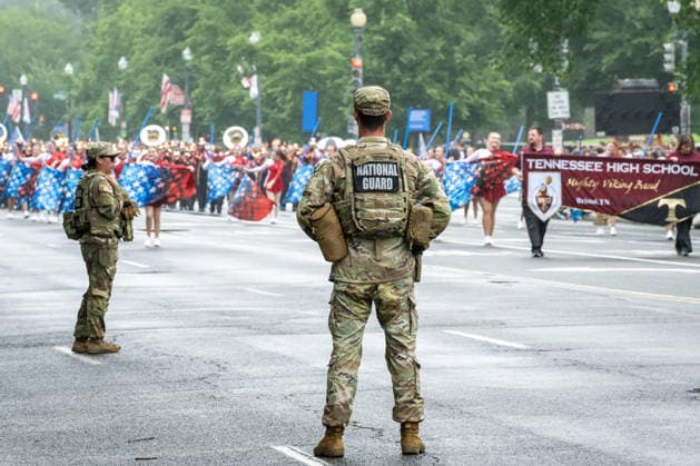 May 25, 2026, Washington, District Of Columbia, Unites States: Members of the District of Columbia National Guard stand along the parade route during the National Memorial Day Parade in Washington, D.C. Washington Unites States - ZUMAk206 20260525_znp_k206_016 Copyright: xMattxKaminskyx