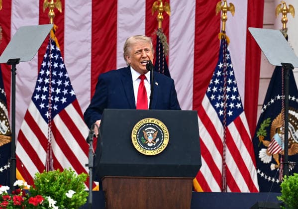 United States President Donald J Trump delivers remarks in the Amphitheater after laying a wreath at the Tomb of the Unknowns at Arlington National Cemetery in Arlington, Virginia on Memorial Day, Monday, May 25, 2026..  WAX20260525221 KylexMazza