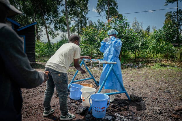 Ebola precautions continue in Democratic Republic of Congo GOMA, DEMOCRATIC REPUBLIC OF THE CONGO - MAY 25: Health workers carry out hand sanitizing, handwashing and temperature screening procedures for travelers at the Kanyaruchinya checkpoint near Goma as part of preventive measures against the Ebola virus in Goma, Democratic Republic of the Congo, on May 25, 2026. Stringer Anadolu Goma Democratic Republic of the Congo. Editorial use only. Please get in touch for any other usage.  Copyright: x2026xAnadoluxStringerx