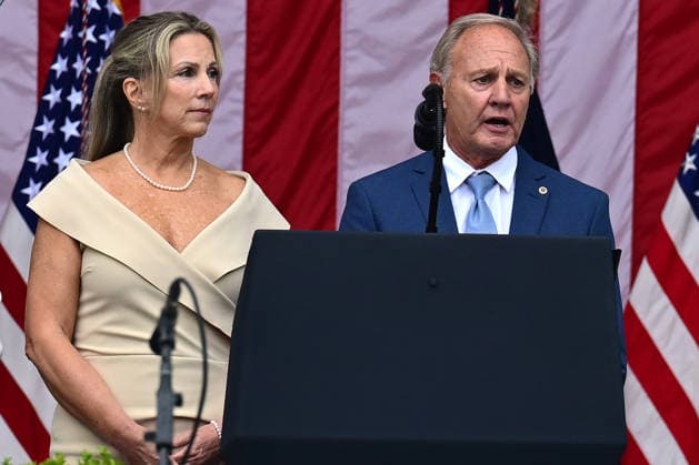 Gold Star Family members Karen Vaughn and Bill Vaughn make remarks prior to United States President Donald J Trump delivering remarks in the Amphitheater after laying a wreath at the Tomb of the Unknowns at Arlington National Cemetery in Arlington, Virginia on Memorial Day, Monday, May 25, 2026. Copyright: xKylexMazzax xPoolxviaxCNPx MediaPunchx