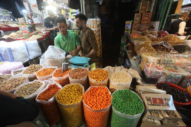 Palestinians walk through Gaza City market ahead of Eid al-Adha Palestinians walk through Omar al-Mukhtar market in Gaza City on May 25, 2026, ahead of Eid al-Adha, as vendors display goods on temporary roadside stalls. The market witnessed weak consumer demand and declining purchasing power amid worsening economic conditions caused by the ongoing war. Photo by Bilal Osama apaimages Gaza city Gaza Strip Palestinian Territory 250526_Gaza_BO_01(22) Copyright: xapaimagesxBilalxOsamax xapaimagesx