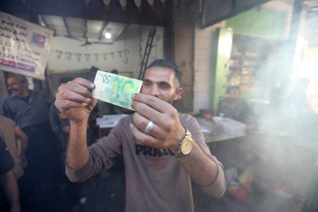 Palestinians walk through Gaza City market ahead of Eid al-Adha Palestinians walk through Omar al-Mukhtar market in Gaza City on May 25, 2026, ahead of Eid al-Adha, as vendors display goods on temporary roadside stalls. The market witnessed weak consumer demand and declining purchasing power amid worsening economic conditions caused by the ongoing war. Photo by Bilal Osama apaimages Gaza city Gaza Strip Palestinian Territory 250526_Gaza_BO_01(23) Copyright: xapaimagesxBilalxOsamax xapaimagesx