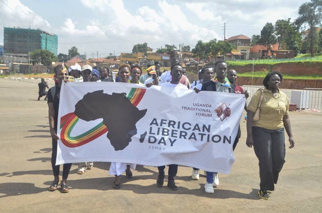 News Bilder des Tages Uganda celebrate the 63rd anniversary of Africa Day KAMPALA, UGANDA - MAY 25: People hold a banner celebrating the 63rd anniversary of Africa Day with cultural performances, exhibitions, and fashion shows representing different countries across the African continent were organized in Kampala, Uganda, on May 25, 2026. Africa Day is celebrated every year on May 25 to commemorate the founding of the Organization of African Unity (OAU), the predecessor of the African Union (AU), and to honor the continent’s achievements. Nicholas Kajoba Anadolu Kampala Uganda. Editorial use only. Please get in touch for any other usage.  Copyright: x2026xAnadoluxNicholasxKajobax