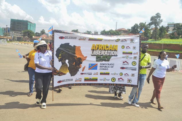 Uganda celebrate the 63rd anniversary of Africa Day KAMPALA, UGANDA - MAY 25: People hold a banner celebrating the 63rd anniversary of Africa Day with cultural performances, exhibitions, and fashion shows representing different countries across the African continent were organized in Kampala, Uganda, on May 25, 2026. Africa Day is celebrated every year on May 25 to commemorate the founding of the Organization of African Unity (OAU), the predecessor of the African Union (AU), and to honor the continent’s achievements. Nicholas Kajoba Anadolu Kampala Uganda. Editorial use only. Please get in touch for any other usage.  Copyright: x2026xAnadoluxNicholasxKajobax