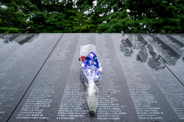 Flowers are left at the Korean War Memorial on Memorial Day in Washington, DC on Monday, May 25, 2026.  WAP20260525329 BONNIExCASH