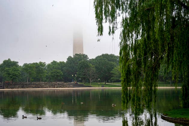 The Washington Monument is seen through fog around the Carp Pond on Memorial Day in Washington, DC on Monday, May 25, 2026.  WAP20260525314 BONNIExCASH