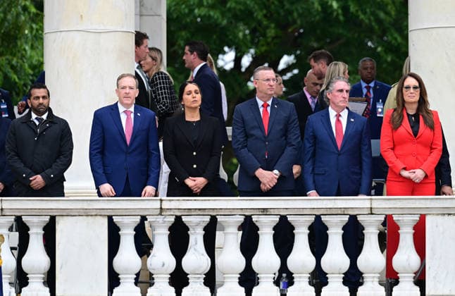 Trump Remarks on Memorial Day at Arlington National Cemetery Members of the Cabinet look on as United States President Donald J Trump delivers remarks in the Amphitheater after laying a wreath at the Tomb of the Unknowns at Arlington National Cemetery in Arlington, Virginia on Memorial Day, Monday, May 25, 2026. From left to right: Kash Patel, Director, Federal Bureau of Investigation (FBI); Lee Zeldin, Director, US Environmental Protection Agency (EPA); Tulsi Gabbard, Director of National Intelligence (DNI); US Secretary of Veterans Affairs Doug Collins; US Secretary of the Interior and Chair, National Energy Council and White House Energy Czar Doug Burgum; and US Secretary of Agriculture Brooke Rollins. Credit: Kyle Mazza Pool via CNP A  Copyright: xPool ABACAx