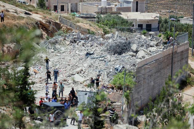 Israeli Demolition West Bank Family Displaced Eid Al-Adha People stand on and around the rubble of a demolished building in Nahhalin, occupied West Bank, on May 25, 2026. The demolition, carried out by Israeli forces who stated the structure was built without a permit, displaced an eight-member Palestinian family just two days before the Islamic holiday of Eid al-Adha. Bethlehem West Bank Palestinian Territories Copyright: xMosabxShawerx