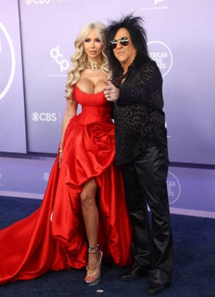 Josie Stevens and Steve Stevens attend the 52nd annual American Music Awards at the MGM Grand Garden Arena in Las Vegas on Monday, May 25, 2026.  LAV20260525474 JAMESxATOA