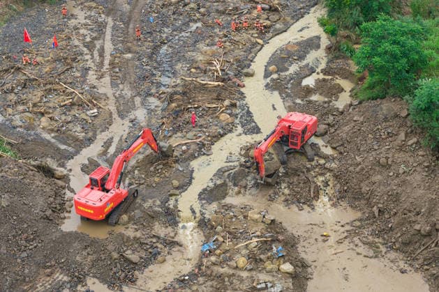 CHONGQING, CHINA - MAY 25: Rescuers carry out search and rescue work at the disaster-hit area after a heavy rainstorm hit Yongchuan District on May 25, 2026 in Chongqing, China. Record-breaking torrential rain battered Yongchuan District in southwest China s Chongqing Municipality from late May 23 to May 24, triggering flash floods, landslides and mudslides. Rescue operations are still underway as multiple towns and subdistricts suffered severe damage.  Copyright: xChinaxNewsxServicex 111643998120