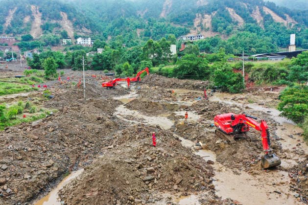 (260526) -- BEIJING, May 26, 2026 -- An aerial drone photo taken on May 25, 2026 shows the rescue site of the flood-hit area after a heavy rainstorm hit Yongchuan District in southwest China s Chongqing Municipality. Record-breaking torrential rain battered Yongchuan District in southwest China s Chongqing Municipality from late Saturday to Sunday, triggering flash floods, landslides and mudslides. Rescue operations are still underway as multiple towns and subdistricts suffered severe damage. ) XINHUA PHOTOS OF THE DAY WangxQuanchao 