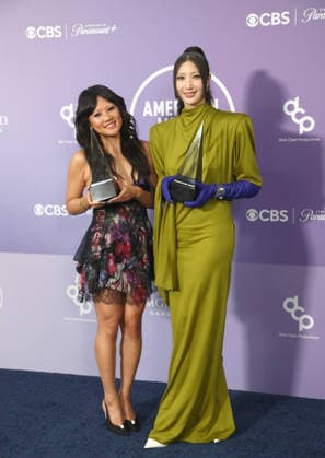 Rei Ami and EJAE of Huntrix, winners of the Song of the Year award for Golden appear backstage on the winners walk during the 52nd annual American Music Awards at the MGM Grand Garden Arena in Las Vegas on Monday, May 25, 2026.  LAV20260525554 JAMESxATOA