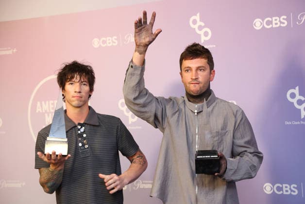 Josh Dun and Tyler Joseph of Twenty One Pilots, winners of the Best Rock Alternative Artist award, appear backstage on the winners walk during the 52nd annual American Music Awards at the MGM Grand Garden Arena in Las Vegas on Monday, May 25, 2026.  LAV20260525565 JAMESxATOA