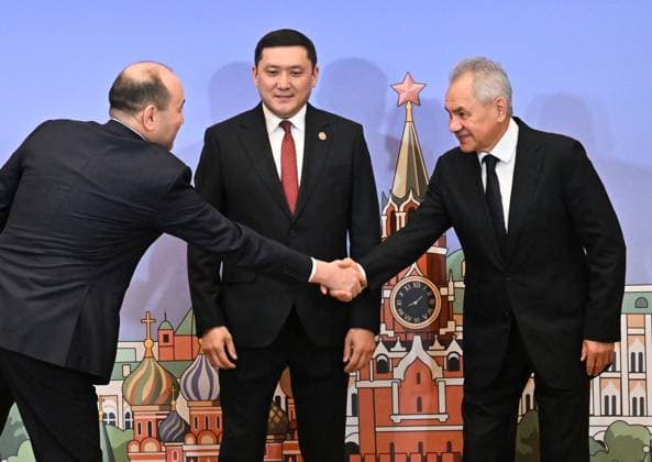 Russia CSTO Security Council Secretaries 9173444 26.05.2026 Kazakh Security Council Secretary Gizat Nurdauletov, left, and Russian Security Council Secretary Sergei Shoigu, right, shake hands as Kyrgyz Security Council Secretary Adilet Orozbekov stands in the centre before a meeting of the Committee of Security Councils Secretaries of the Collective Security Treaty Organization (CSTO) in Moscow, Russia. Stanislav Krasilnikov Sputnik Moscow Russia  Copyright: xStanislavxKrasilnikovx