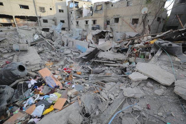 Palestinians inspect damage after Israeli strike in Nuseirat camp Palestinians inspect damage to their homes following an Israeli strike that targeted a house belonging to the al-Tawil family in the Nuseirat refugee camp in the central Gaza Strip on May 25, 2026. The strike destroyed the house completely and caused severe damage to neighboring homes. According to Palestinian medical sources, four Palestinians were wounded in the attack, which came after residents were warned to evacuate the area the previous night. Photo by Hassan al-Jedi apaimages Nusairat Gaza Strip Palestinian Territory 260526_Nuseirat_HJ_00(21).jpeg Copyright: xapaimagesxHassanxal-Jedixx xapaimagesx