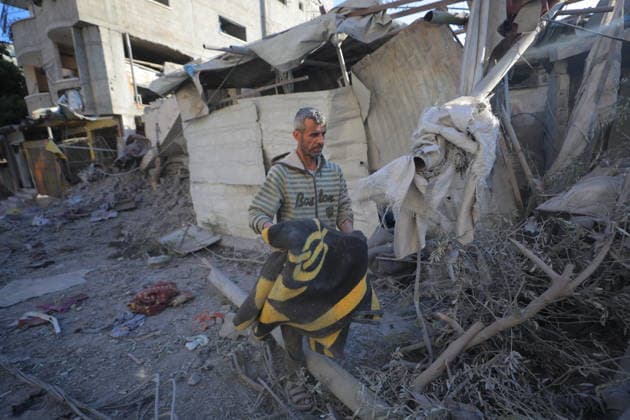 Palestinians inspect damage after Israeli strike in Nuseirat camp Palestinians inspect damage to their homes following an Israeli strike that targeted a house belonging to the al-Tawil family in the Nuseirat refugee camp in the central Gaza Strip on May 25, 2026. The strike destroyed the house completely and caused severe damage to neighboring homes. According to Palestinian medical sources, four Palestinians were wounded in the attack, which came after residents were warned to evacuate the area the previous night. Photo by Hassan al-Jedi apaimages Nusairat Gaza Strip Palestinian Territory 260526_Nuseirat_HJ_00(7).jpeg Copyright: xapaimagesxHassanxal-Jedixx xapaimagesx
