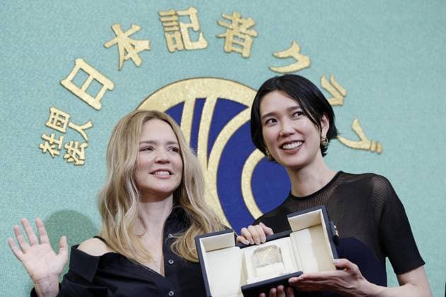 Cannes winners at press conference in Tokyo Actors Tao Okamoto (R) and Virginie Efira pose for a photo following a press conference at the Japan National Press Club in Tokyo on May 26, 2026, after the two jointly won the best actress award at the Cannes Film Festival on May 23 for All of a Sudden, directed by Japan s Ryusuke Hamaguchi, who also attended.  A14AA0005615114P