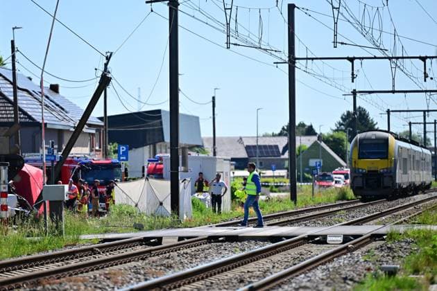 the scene of an accident between a train and a minivan, at the railway crossing Vierhuizen, in Buggenhout, Tuesday 26 May 2026. The accident happened around 8:15 am. Several people have been killed. According to initial reports, the level crossing was closed at the time of the accident.  DIRKxWAEM 175090055