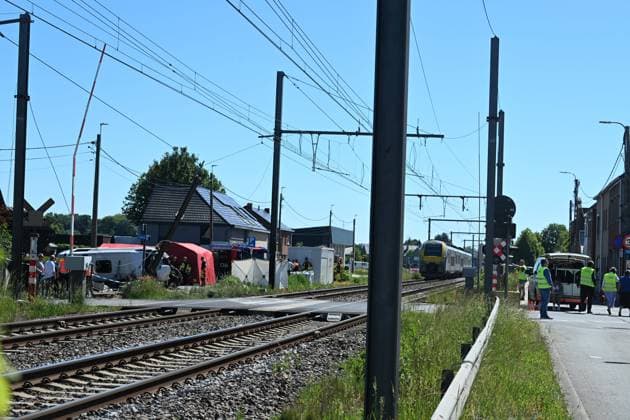 Schoolbus Gets Run Over By A Train BUGGENHOUT, BELGIUM - MAY 26 : In a train accident people have died in a collision between a train and a minibus in Buggenhout; the minibus was carrying seven schoolchildren and two adults: The barriers were down.onMay 26, 2026 in Buggenhout, Belgium, 26 05 2026 Buggenhout Belgium  Copyright: xBertxVanxDenxBrouckex