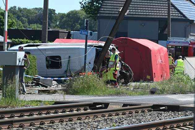 Schoolbus Gets Run Over By A Train BUGGENHOUT, BELGIUM - MAY 26 : In a train accident people have died in a collision between a train and a minibus in Buggenhout; the minibus was carrying seven schoolchildren and two adults: The barriers were down.onMay 26, 2026 in Buggenhout, Belgium, 26 05 2026 Buggenhout Belgium  Copyright: xBertxVanxDenxBrouckex