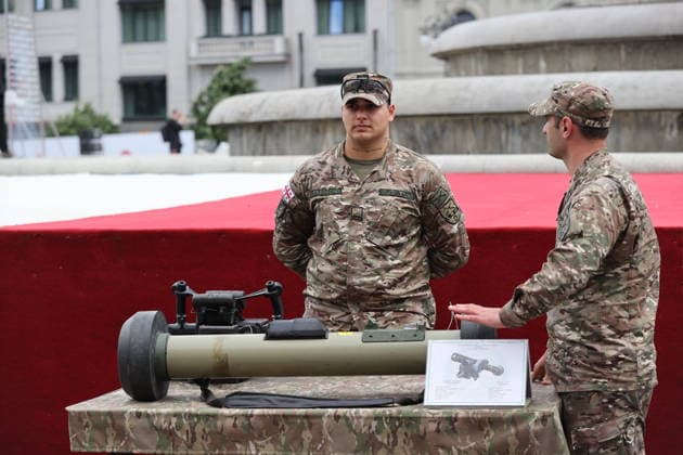 Georgia marks 108th anniversary of the founding of the republic TBILISI, GEORGIA - MAY 26: Local citizens and tourists inspect displayed military hardware and tactical vehicles at Freedom Square during the official celebrations marking the 108th anniversary of the founding of the Democratic Republic of Georgia in Tbilisi, Georgia on May 26, 2026. The national holiday was marked by a formal military parade in the capital. Following the official military march-past overseen by state officials, the cordoned-off square was opened to thousands of spectators under extensive security measures. Visitors, including families and international travelers, showed significant interest in the defense systems, armored personnel carriers, and specialized in  Copyright: x2026xAnadoluxDavitxKachkachishvilix