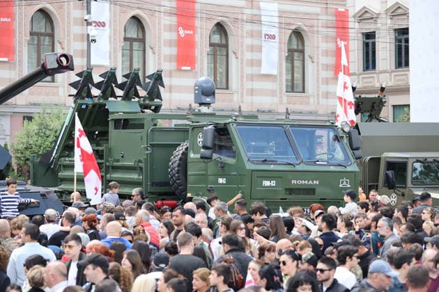 Georgia marks 108th anniversary of the founding of the republic TBILISI, GEORGIA - MAY 26: Local citizens and tourists inspect displayed military hardware and tactical vehicles at Freedom Square during the official celebrations marking the 108th anniversary of the founding of the Democratic Republic of Georgia in Tbilisi, Georgia on May 26, 2026. The national holiday was marked by a formal military parade in the capital. Following the official military march-past overseen by state officials, the cordoned-off square was opened to thousands of spectators under extensive security measures. Visitors, including families and international travelers, showed significant interest in the defense systems, armored personnel carriers, and specialized in  Copyright: x2026xAnadoluxDavitxKachkachishvilix