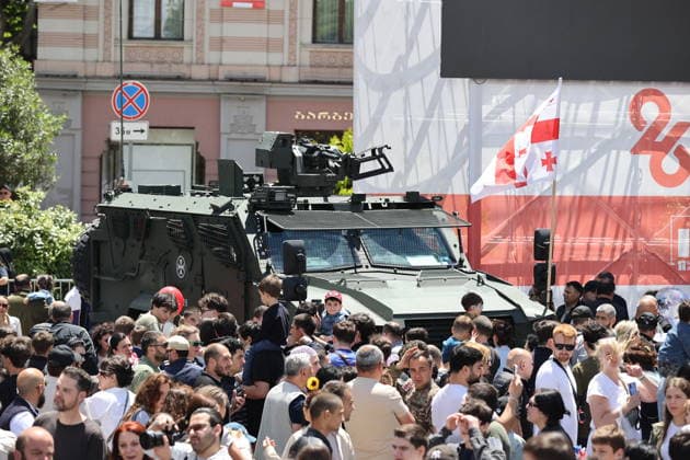 Georgia marks 108th anniversary of the founding of the republic TBILISI, GEORGIA - MAY 26: Local citizens and tourists inspect displayed military hardware and tactical vehicles at Freedom Square during the official celebrations marking the 108th anniversary of the founding of the Democratic Republic of Georgia in Tbilisi, Georgia on May 26, 2026. The national holiday was marked by a formal military parade in the capital. Following the official military march-past overseen by state officials, the cordoned-off square was opened to thousands of spectators under extensive security measures. Visitors, including families and international travelers, showed significant interest in the defense systems, armored personnel carriers, and specialized in  Copyright: x2026xAnadoluxDavitxKachkachishvilix
